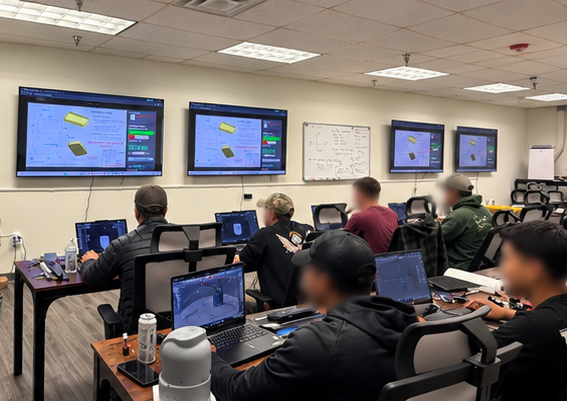 Part models shown on classroom displays during an FFF-301 speed exercise
